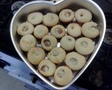 A picture of step 8 of cheesy corn dog bites.