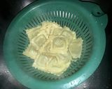 A picture of step 4 of Mike's 10 MIN Creamy Alfredo Ravioli.