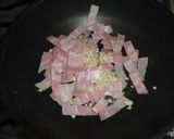 A picture of step 2 of Rice Bowl with Aubergine, Bacon and Melting Cheese.