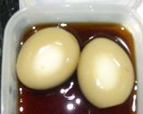 A picture of step 4 of Soft-Boiled Marinated Egg Onigiri.