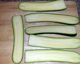 A picture of step 1 of Stuffed Zucchini Boats.