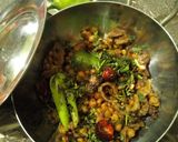 A picture of step 4 of Chana dal karela.