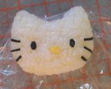 A picture of step 1 of Sakura & Doll's Festival Character Bento Hello Kitty.