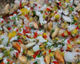 Foto del paso 3 de la receta: Aguacate relleno de ceviche de langostinos y mejillones