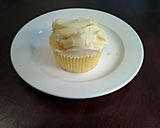 A picture of step 15 of White Chocolate Cupcakes with White Chocolate Whipped Cream Frosting.