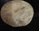 A picture of step 11 of Moong dal paratha Moong dal ki puran puli Pesarapappu bobbatlu.