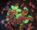 A picture of step 1 of Steam Egg White with Goji Berry and Ginko Nuts.