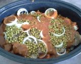 A picture of step 2 of Pork chop dinner in dutch oven.
