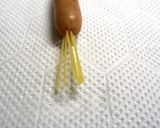 A picture of step 2 of For Character Bento: Locks of Hair for a Wiener Sausage.