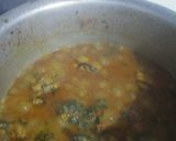 A picture of step 6 of Palak chicken with boiled rice.