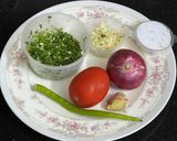 A picture of step 1 of Vaghareli Lasaniya (Green Garlic) Rotli.