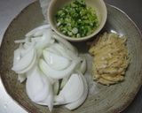 A picture of step 1 of Miso Soup with Sweet Onion and Aburaage.