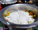 A picture of step 3 of Avial curry with rice.