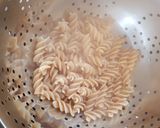 A picture of step 1 of My Smoked Sausage and smoked cheese Pasta.😊.