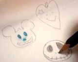 A picture of step 6 of Kabocha Squash Custard Puddings Decorated with Chocolate Characters for Halloween.