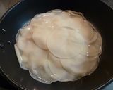 A picture of step 3 of Ham and Cheese Grilled Between Gyoza Skins.