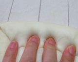 A picture of step 4 of Fluffy Powdered Snow Christmas Bread Wreath.