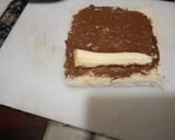 A picture of step 1 of Nuetella and banana french toast roll ups.