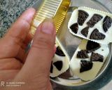 A picture of step 4 of Yummy Oreo white chocolates in cups.