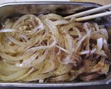 A picture of step 1 of Aussie Beef Rolls Marinated in Sweet Onions.