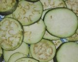 A picture of step 1 of Dahi walay baigan (Egg Plant).