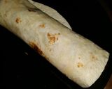 A picture of step 13 of Iz's Pulled Pork Burrito.