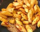 A picture of step 1 of Baby corn masala curry.