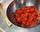 Une image de l'étape 14 de Poulet aux carottes, épices et lait de coco.