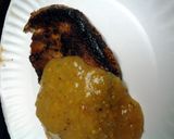 A picture of step 2 of pan fried porkchops.