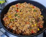 A picture of step 3 of Mexican rice pulao.