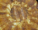 A picture of step 12 of Crispy Winged Gyoza with Grated Cheese.