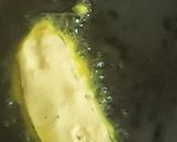 A picture of step 2 of Begun Bhaja.