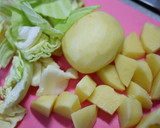 A picture of step 1 of Simmered Spring Cabbage and Spring Onions with Mustard Cream.