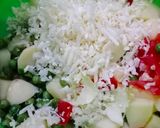 A picture of step 2 of Alu matar raita 🥔.