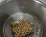 A picture of step 1 of Cheesy maggi.