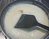 A picture of step 9 of Spinach Corn Ravioli in white sauce.