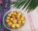A picture of step 5 of Bengali Rosh Bora / Sweet Lentil Dumplings.