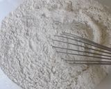 A picture of step 2 of Cardamon Mandazi.