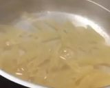 A picture of step 1 of Tomatoes Cheese pasta.
