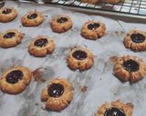 Foto langkah ke 5 dari resep Blueberry thumbprint cookies.