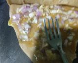 A picture of step 4 of Aanda parantha (egg parantha).