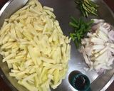 A picture of step 1 of Bengali Aloo Pyaaz Chocchori.
