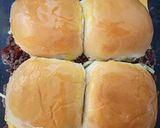 A picture of step 8 of Cheeseburger sliders with paprika wedges.