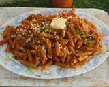 A picture of step 9 of Butter chicken pasta.