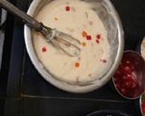A picture of step 3 of Christmas special vanilla tutti fruti cup cakes.