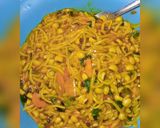 A picture of step 3 of Taliyar Hausa wit alaiyahu and beans.
