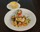A picture of step 12 of Seared Steak and Shrimp with Sriracha Hollindaise and Roasted Tomatoes.