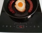 Foto del paso 2 de la receta: Huevo encerrado con salchichas