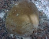 Foto del paso 2 de la receta: Masitas de cacao y nueces rellenas de dulce de leche