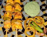 A picture of step 4 of Achari paneer tikka with achari onion rings.